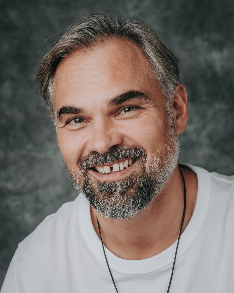 Nisarga Eryk Dobosz, smiling